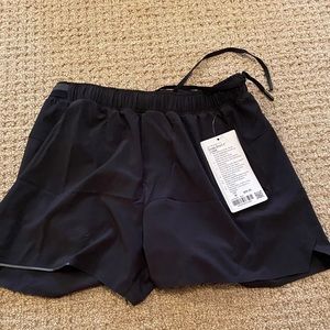 Size Medium NWT lululemon black surge short 4” inseam lined